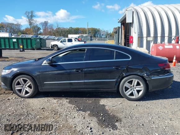 ✅ 2014 Volkswagen CC Sport • VIN: WVWBP7AN4EE504228 • Lot: 43429571. Listed on IAAI with 101,143 mi. Free auction sales archive from the USA and detailed vehicle history report at DreamBid. Image 14.