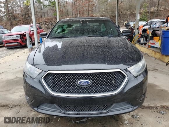 ✅ 2014 Ford Taurus SHO • VIN: 1FAHP2KT2EG107878 • Lot: 44894075. Listed on Copart with 103,472 mi. Free auction sales archive from the USA and detailed vehicle history report at DreamBid. Image 5.