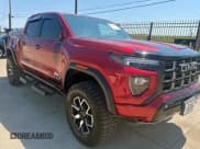 ✅ 2023 GMC Canyon 4WD AT4X • VIN: 1GTP6EEK9P1153310 • Лот: 80522335. Опубликован ранее на Copart с пробегом 11 750 миль. Бесплатный доступ к архиву аукционных продаж из США и подробный отчёт об истории автомобиля на DreamBid. Изображение 1.