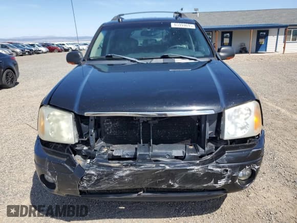 ✅ 2005 GMC Envoy SLT • VIN: 1GKET16S056174980 • Lot: 65994695. Listed on Copart with 140,649 mi. Free auction sales archive from the USA and detailed vehicle history report at DreamBid. Image 5.