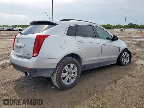 ✅ 2016 Cadillac SRX • VIN: 3GYFNAE31GS575354 • Lot: 64786435. Wystawiony na Copart z przebiegiem 176 079 mil. Bezpłatny archiwum sprzedaży aukcyjnych z USA i szczegółowy raport historii pojazdu na DreamBid. Zdjęcie 3.