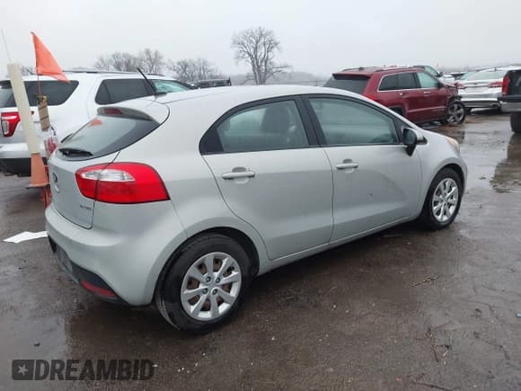 ✅ 2013 Kia Rio EX • VIN: KNADN5A3XD6196585 • Lot: 43720844. Listed on IAAI with 102,075 mi. Free auction sales archive from the USA and detailed vehicle history report at DreamBid. Image 4.