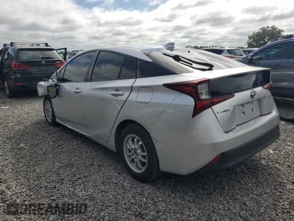 2021 Toyota Prius L Eco with VIN JTDKAMFU0M3141002, listed as a Copart auction lot 84425805 with 73,095 mi miles and Clean title. Bid and sale history available at DreamBid. Image 2.