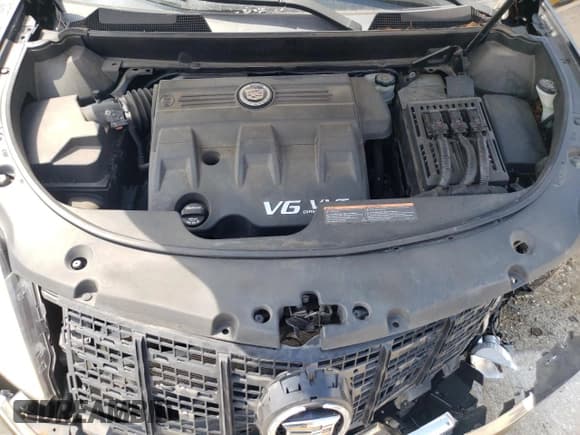 ✅ 2013 Cadillac SRX • VIN: 3GYFNAE33DS620936 • Lot: 70595405. Listed on Copart with 106,338 mi. Free auction sales archive from the USA and detailed vehicle history report at DreamBid. Image 12.