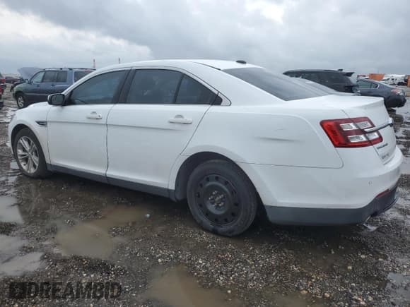 ✅ 2017 Ford Taurus SEL • VIN: 1FAHP2H87HG116843 • Lot: 54132345. Listed on Copart with 221,472 mi. Free auction sales archive from the USA and detailed vehicle history report at DreamBid. Image 2.
