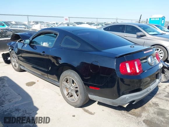 ✅ 2012 Ford Mustang Premium • VIN: 1ZVBP8AM7C5288303 • Lot: 43486549. Listed on IAAI with 127,684 mi. Free auction sales archive from the USA and detailed vehicle history report at DreamBid. Image 3.