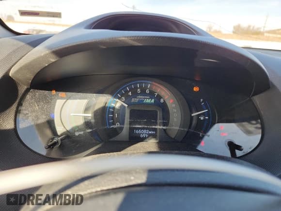 ✅ 2012 Honda Insight LX • VIN: JHMZE2H54CS003446 • Лот: 92131005. Опубликован ранее на Copart с пробегом 165 082 миль. Бесплатный доступ к архиву аукционных продаж из США и подробный отчёт об истории автомобиля на DreamBid. Изображение 9.