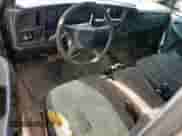 2002 Chevrolet Silverado 1500 with VIN 1GCEC14W32Z284577, listed as a Copart auction lot 69987265 with 504,167 mi miles and Salvage title. Bid and sale history available at DreamBid. Image 8.