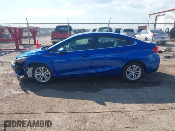 2019 Chevrolet Cruze LT with VIN 1G1BE5SM4K7108535, listed as a IAAI auction lot 43352905 with 102,584 mi miles and . Bid and sale history available at DreamBid. Image 14.