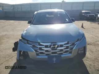 2022 Hyundai Santa Cruz SEL z VIN 5NTJB4AE0NH018798, wystawiony jako Copart lot #72095624 z przebiegiem 19 097 mil mil oraz Szkoda całkowita • Salvage title. Historia ofert i sprzedaży dostępna na DreamBid. Obrazek 5.