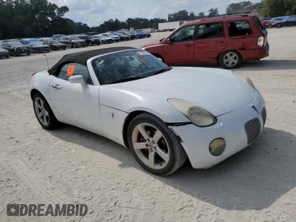 ✅ 2006 Pontiac Solstice • VIN: 1G2MB35B46Y117327 • Lot: 77982244. Wystawiony na Copart z przebiegiem 128 089 mil. Bezpłatny archiwum sprzedaży aukcyjnych z USA i szczegółowy raport historii pojazdu na DreamBid. Zdjęcie 4.