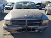 ✅ 2002 Dodge Dakota • VIN: 1B7GL12X02S577219 • Lot: 77067374. Wystawiony na Copart z przebiegiem 181 351 mil. Bezpłatny archiwum sprzedaży aukcyjnych z USA i szczegółowy raport historii pojazdu na DreamBid. Zdjęcie 5.