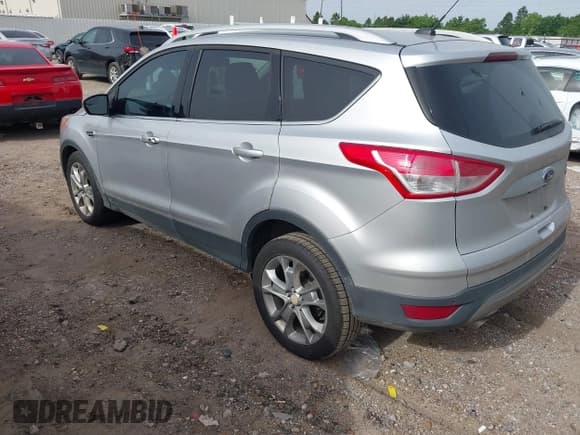 ✅ 2014 Ford Escape Titanium • VIN: 1FMCU0J91EUB97710 • Lot: 42261415. Wystawiony na IAAI z przebiegiem 128 286 mil. Bezpłatny archiwum sprzedaży aukcyjnych z USA i szczegółowy raport historii pojazdu na DreamBid. Zdjęcie 3.