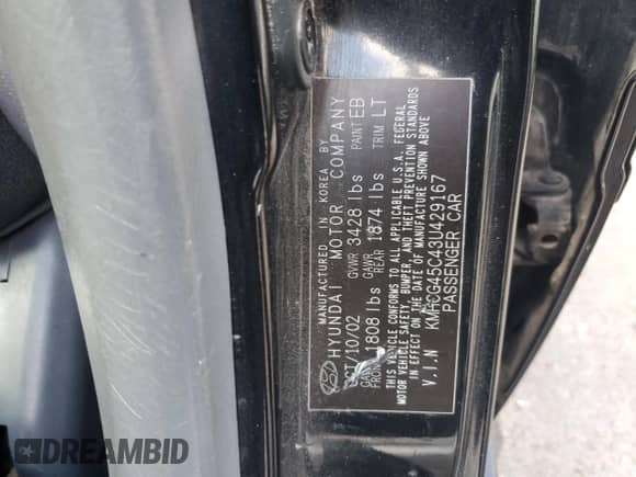 2003 Hyundai Accent GL with VIN KMHCG45C43U429167, listed as a Copart auction lot 79658124 with 80,926 mi miles and Clean title. Bid and sale history available at DreamBid. Image 12.