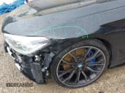 ✅ 2018 BMW 5 Series M550i xDrive • VIN: WBAJB9C5XJB286923 • Лот: 42527301. Опубликован ранее на IAAI с пробегом 76 923 миль. Бесплатный доступ к архиву аукционных продаж из США и подробный отчёт об истории автомобиля на DreamBid. Изображение 21.
