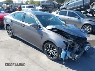 ✅ 2016 Lexus ES 330 • VIN: JTHBK1GG0G2211854 • Lot: 43495739. Listed on IAAI with 102,951 mi. Free auction sales archive from the USA and detailed vehicle history report at DreamBid. Image 1.