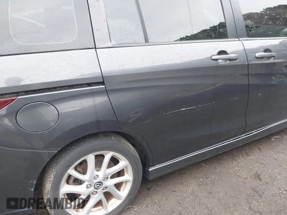 ✅ 2013 Mazda 5 Touring • VIN: JM1CW2CL8D0149999 • Lot: 42903215. Listed on IAAI with 103,051 mi. Free auction sales archive from the USA and detailed vehicle history report at DreamBid. Image 6.