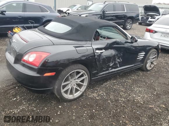 ✅ 2005 Chrysler Crossfire Limited • VIN: 1C3AN65L95X049647 • Lot: 93609175. Listed on Copart with 153,545 mi. Free auction sales archive from the USA and detailed vehicle history report at DreamBid. Image 3.