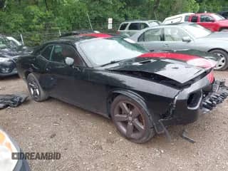 2014 Dodge Challenger SXT с VIN 2C3CDYAG1EH124488, выставлен на аукционе IAAI как лот 42437859 с пробегом 69 257 миль миль и . История ставок и продаж доступна на DreamBid. Изображение 1.