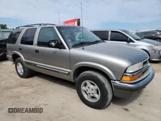 ✅ 2001 Chevrolet Blazer LS • VIN: 1GNDT13W712177561 • Lot: 81979655. Wystawiony na Copart z przebiegiem 181 976 mil. Bezpłatny archiwum sprzedaży aukcyjnych z USA i szczegółowy raport historii pojazdu na DreamBid. Zdjęcie 4.