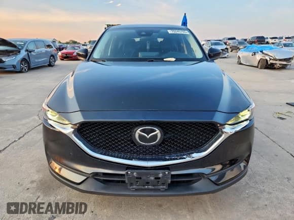 ✅ 2021 Mazda CX-5 Touring • VIN: JM3KFACMXM0462090 • Лот: 70245705. Опубликован ранее на Copart с пробегом 96 650 миль. Бесплатный доступ к архиву аукционных продаж из США и подробный отчёт об истории автомобиля на DreamBid. Изображение 5.