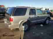 2000 Chevrolet Blazer LS z VIN 1GNDT13W7Y2221505, wystawiony jako Copart lot #78797974 z przebiegiem 149 678 mil mil oraz Nie do naprawy • Non repairable. Historia ofert i sprzedaży dostępna na DreamBid. Obrazek 3.