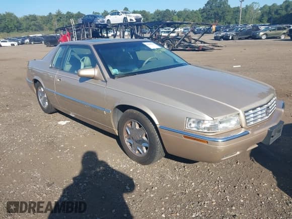 ✅ 1997 Cadillac Eldorado • VIN: 1G6EL12Y4VU602876 • Lot: 43239613. Listed on IAAI with 79,117 mi. Free auction sales archive from the USA and detailed vehicle history report at DreamBid. Image 1.