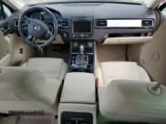 ✅ 2016 Volkswagen Touareg Sport • VIN: WVGEF9BP3GD008823 • Lot: 56838985. Listed on Copart with 49,612 mi. Free auction sales archive from the USA and detailed vehicle history report at DreamBid. Image 8.