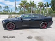 ✅ 2013 Dodge Charger SXT Plus • VIN: 2C3CDXJG1DH584579 • Lot: 42128401. Listed on IAAI with 100,388 mi. Free auction sales archive from the USA and detailed vehicle history report at DreamBid. Image 14.