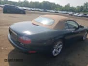 ✅ 2003 Jaguar XK • VIN: SAJDA42C532A36020 • Lot: 60656805. Wystawiony na Copart z przebiegiem 65 020 mil. Bezpłatny archiwum sprzedaży aukcyjnych z USA i szczegółowy raport historii pojazdu na DreamBid. Zdjęcie 3.