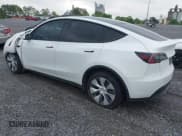 ✅ 2023 Tesla Model Y Long Range • VIN: 7SAYGDEE7PF596216 • Lot: 41557542. Listed on IAAI with 95,065 mi. Free auction sales archive from the USA and detailed vehicle history report at DreamBid. Image 3.