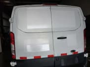 ✅ 2015 Ford Transit Cargo • VIN: 1FTNR1ZM8FKA45398 • Lot: 42575775. Listed on IAAI with 111,526 mi. Free auction sales archive from the USA and detailed vehicle history report at DreamBid. Image 1.