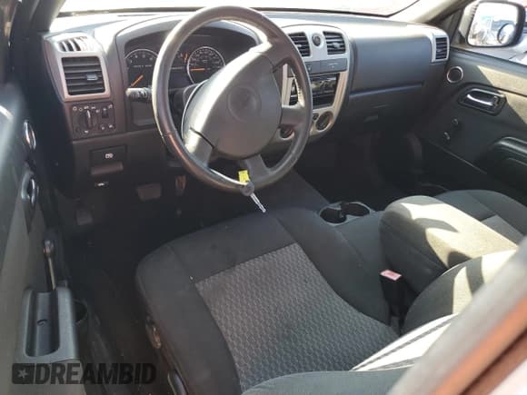 ✅ 2009 Chevrolet Colorado 1LT • VIN: 1GCCS149X98138634 • Лот: 87294575. Опубликован ранее на Copart с пробегом 114 308 миль. Бесплатный доступ к архиву аукционных продаж из США и подробный отчёт об истории автомобиля на DreamBid. Изображение 8.