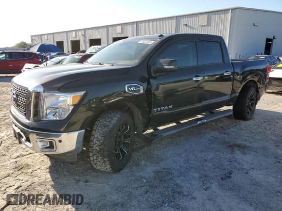 ✅ 2017 Nissan Titan Platinum Reserve • VIN: 1N6AA1E65HN536197 • Lot: 57022465. Listed on Copart with 93,579 mi. Free auction sales archive from the USA and detailed vehicle history report at DreamBid. Image 1.