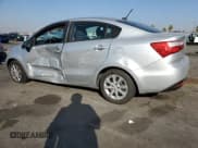 ✅ 2015 Kia Rio LX • VIN: KNADM4A39F6445362 • Лот: 82270595. Опубликован ранее на Copart с пробегом 126 990 миль. Бесплатный доступ к архиву аукционных продаж из США и подробный отчёт об истории автомобиля на DreamBid. Изображение 2.