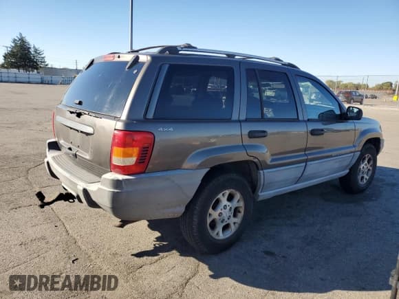 ✅ 1999 Jeep Grand Cherokee Laredo • VIN: 1J4GW58S9XC723378 • Lot: 90095705. Listed on Copart with 177,816 mi. Free auction sales archive from the USA and detailed vehicle history report at DreamBid. Image 3.