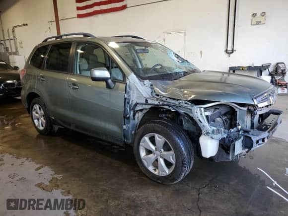 2015 Subaru Forester Premium with VIN JF2SJADC1FG527174, listed as a Copart auction lot 63312005 with 76,204 mi miles and Salvage title. Bid and sale history available at DreamBid. Image 4.