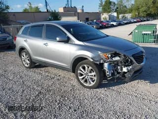 ✅ 2013 Mazda CX-9 Grand Touring • VIN: JM3TB2DA0D0412339 • Lot: 43334409. Wystawiony na IAAI z przebiegiem 205 821 mil. Bezpłatny archiwum sprzedaży aukcyjnych z USA i szczegółowy raport historii pojazdu na DreamBid. Zdjęcie 1.