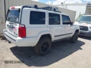 ✅ 2007 Jeep Commander Sport • VIN: 1J8HG48P97C601058 • Lot: 42489447. Listed on IAAI with 200,103 mi. Free auction sales archive from the USA and detailed vehicle history report at DreamBid. Image 4.