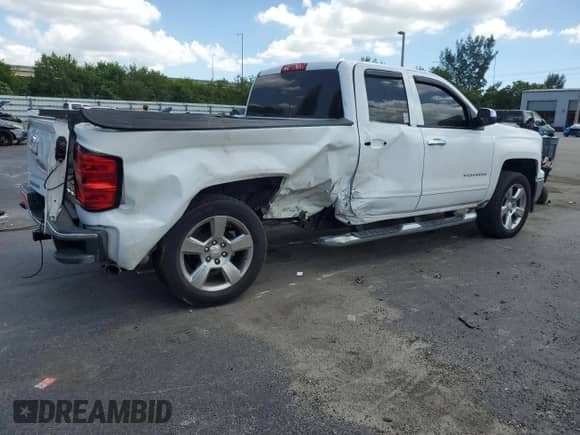 2015 Chevrolet Silverado 1500 LT with VIN 1GCRCREC8FZ362782, listed as a Copart auction lot 69407325 with 34,390 mi miles and Salvage title. Bid and sale history available at DreamBid. Image 3.