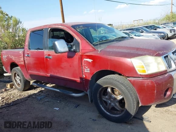 ✅ 2004 Nissan Titan SE • VIN: 1N6AA07B94N520633 • Lot: 42967037. Listed on IAAI with 239,838 mi. Free auction sales archive from the USA and detailed vehicle history report at DreamBid. Image 13.