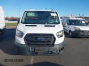 ✅ 2020 Ford Transit Cargo • VIN: 1FTYE1Y80LKB28672 • Lot: 43403450. Listed on IAAI with 101,161 mi. Free auction sales archive from the USA and detailed vehicle history report at DreamBid. Image 12.