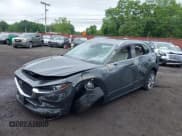 ✅ 2023 Mazda CX-30 S Premium • VIN: 3MVDMBDM9PM570034 • Lot: 42472588. Listed on IAAI with 30,715 mi. Free auction sales archive from the USA and detailed vehicle history report at DreamBid. Image 6.