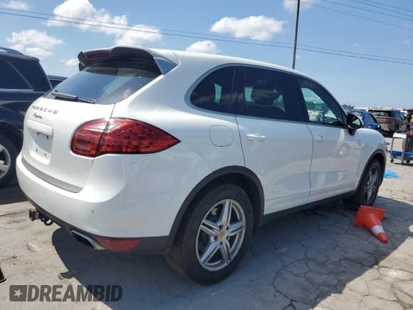 ✅ 2014 Porsche Cayenne • VIN: WP1AA2A27ELA97215 • Lot: 56784685. Listed on Copart with 154,813 mi. Free auction sales archive from the USA and detailed vehicle history report at DreamBid. Image 3.