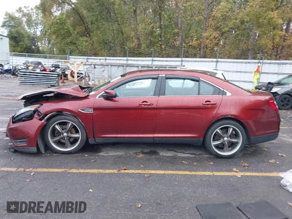 ✅ 2014 Ford Taurus SEL • VIN: 1FAHP2H8XEG138900 • Lot: 43458227. Listed on IAAI with 109,233 mi. Free auction sales archive from the USA and detailed vehicle history report at DreamBid. Image 14.