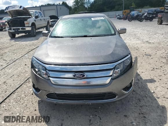 ✅ 2010 Ford Fusion SE • VIN: 3FAHP0HA6AR388810 • Lot: 69731875. Wystawiony na Copart z przebiegiem 185 804 mil. Bezpłatny archiwum sprzedaży aukcyjnych z USA i szczegółowy raport historii pojazdu na DreamBid. Zdjęcie 5.