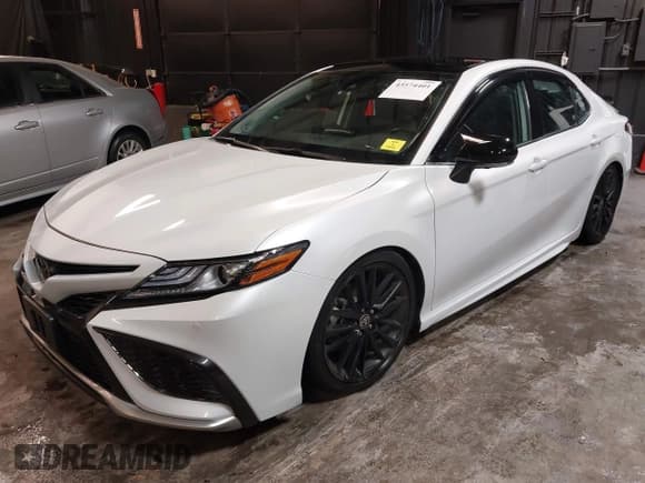 ✅ 2023 Toyota Camry XSE • VIN: 4T1KZ1AK1PU071713 • Lot: 43574401. Listed on IAAI with 51,902 mi. Free auction sales archive from the USA and detailed vehicle history report at DreamBid. Image 2.