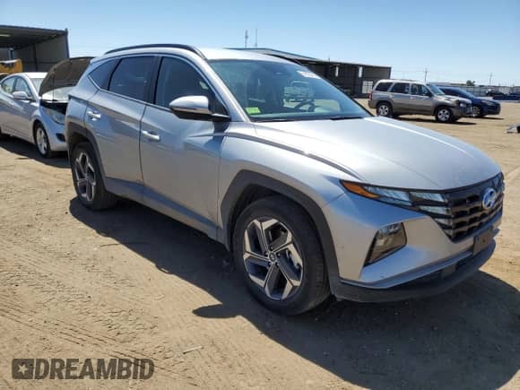 2022 Hyundai Tucson SEL with VIN KM8JBDA24NU033326, listed as a Copart auction lot 61670414 with 30,655 mi miles and Salvage title. Bid and sale history available at DreamBid. Image 4.