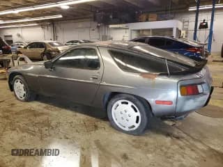 ✅ 1984 Porsche 928 • VIN: WP0JB0925ES861303 • Lot: 41979575. Listed on Copart with 114,593 mi. Free auction sales archive from the USA and detailed vehicle history report at DreamBid. Image 2.