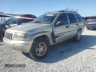 ✅ 2004 Jeep Grand Cherokee • VIN: 1J8GX48S84C329291 • Lot: 43295185. Listed on Copart with 234,680 mi. Free auction sales archive from the USA and detailed vehicle history report at DreamBid. Image 1.